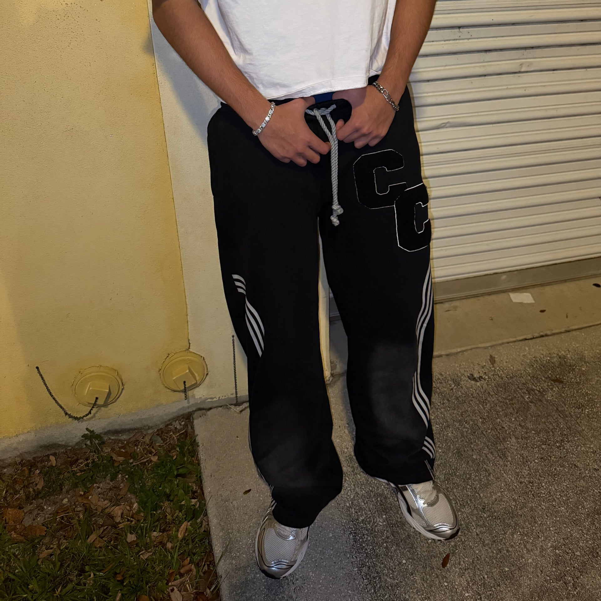 BLACK "TLILTIC" SWEATS